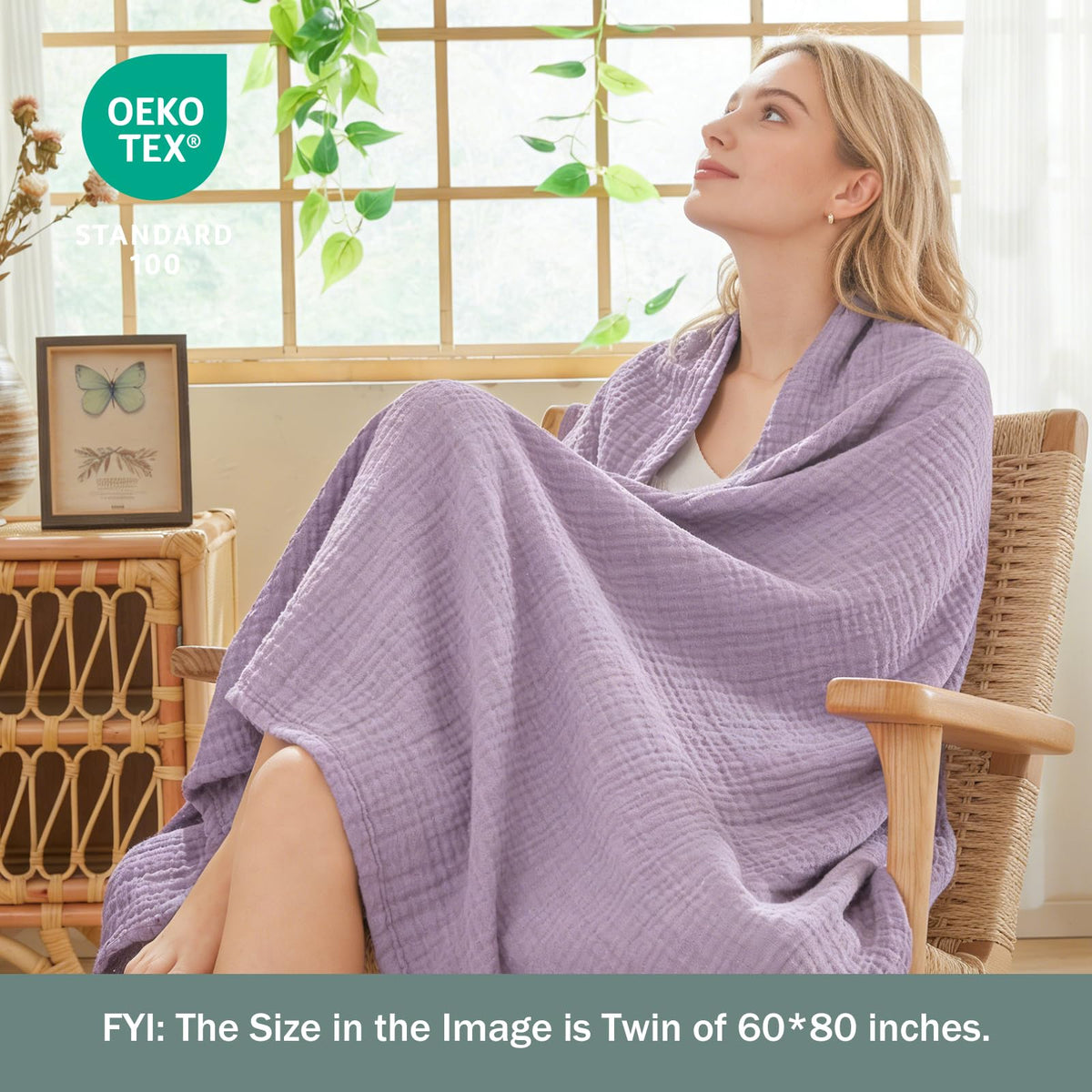 EMME cotton throw blanket showcased on living room couch for relaxed evenings.