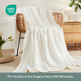 EMME four-layer weave detail emphasizes lightweight warmth and airiness