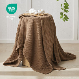 Close-up of EMME muslin blanket texture showing softness