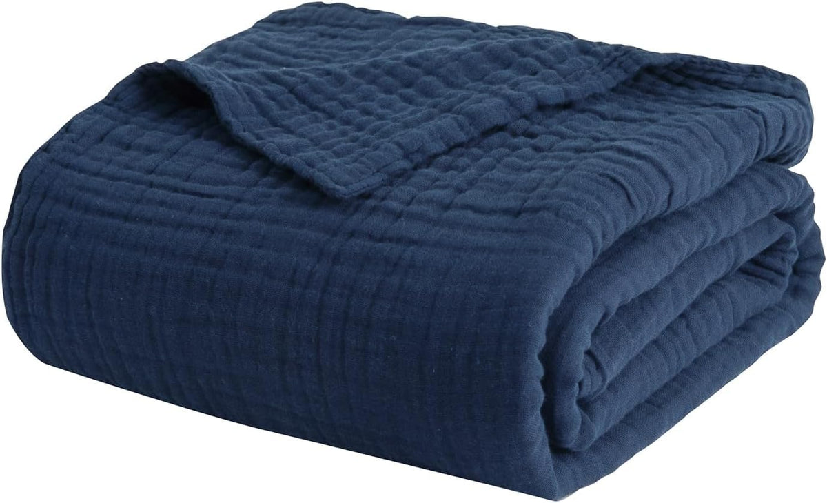 EMME muslin blanket gift-packaged suggests a perfect thoughtful present option.