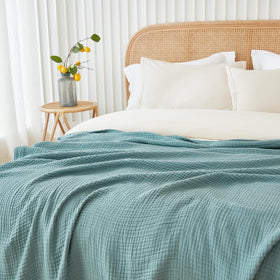 EMME Muslin Blanket teal airy-lightweight drape on a chair