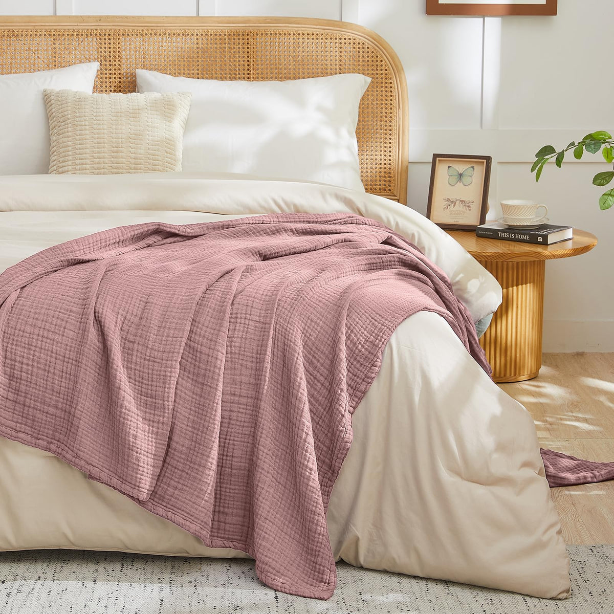 Travel-ready EMME muslin throw packed for outings.