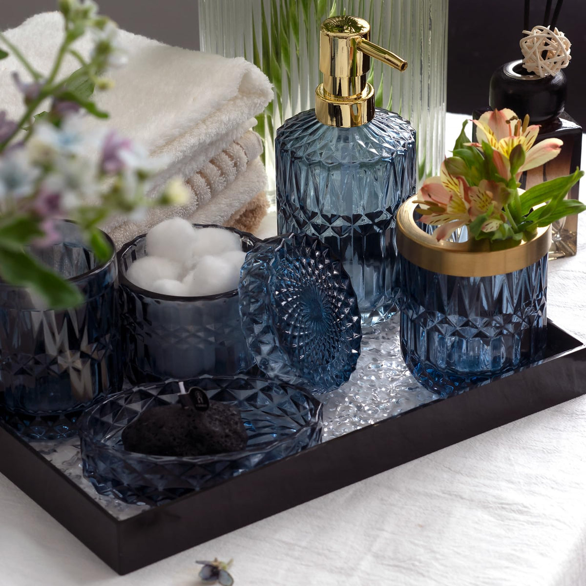 EMPO tumbler in glass doubles as brush keeper for tidy mornings