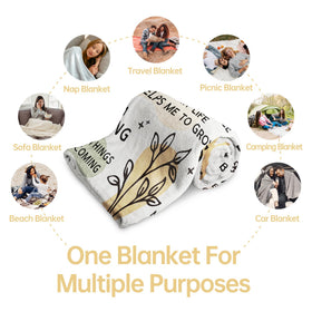 Encoink blanket draped on sofa demonstrates versatile home and travel comfort.