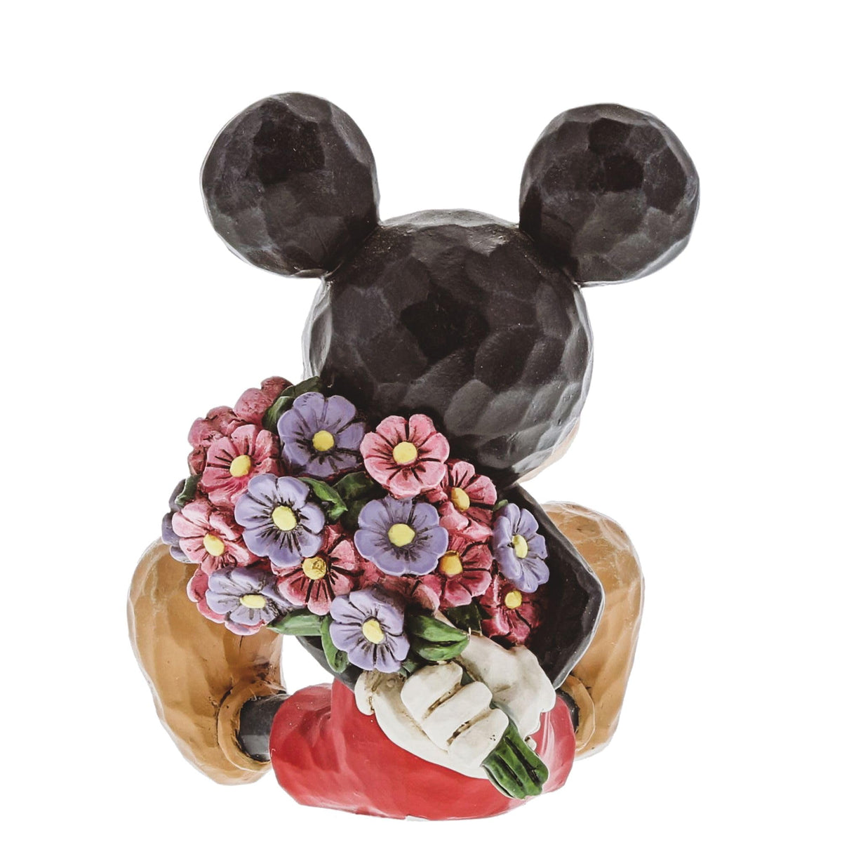 Enesco Disney Traditions pairing with Mini Minnie creates a playful moment.