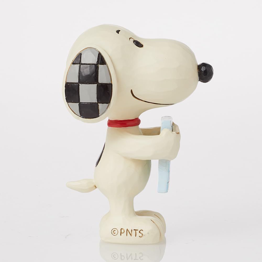Enesco Snoopy miniature with handcrafted paint finish adds warm charm.