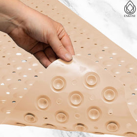 ENKOSI Bath Mat with 200 suction cups provides maximum grip on tub surfaces.