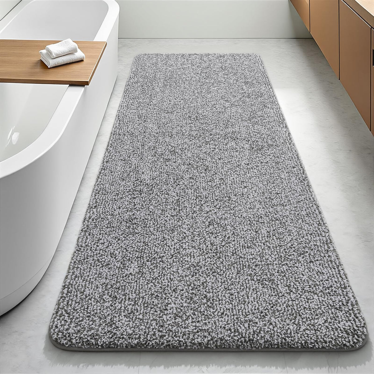 Enqinar bathroom runner 24x60 in green and white on bathroom floor for quick moisture pickup