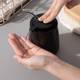 Enra removable pump doubles as cup holder when detached