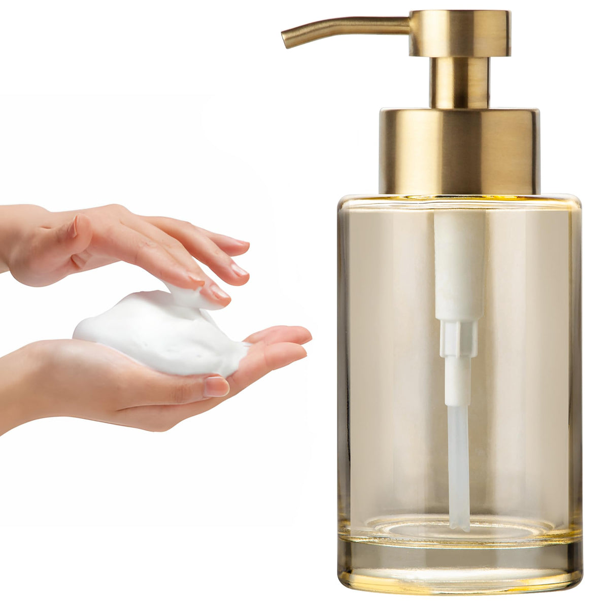 Enra Gold foaming soap dispenser with glass body for stylish bathrooms and kitchens.
