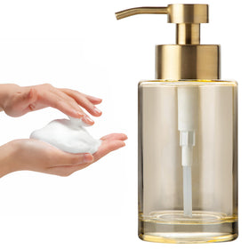 Enra Gold foaming soap dispenser with glass body for stylish bathrooms and kitchens.