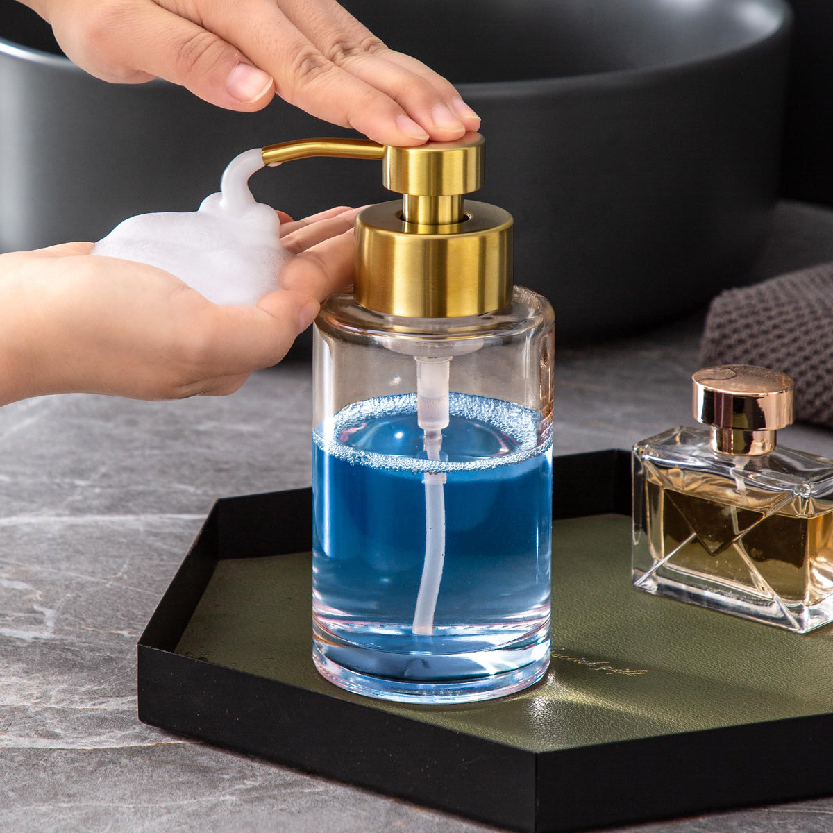 Kitchen sink setup with the Enra dispenser adding a refined touch.
