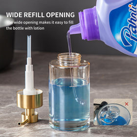 Enra kitchen soap dispenser by the sink for dish soap.