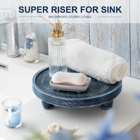 EOSAHR blue wood pedestal riser perfume collection on vanity, stylishly organized