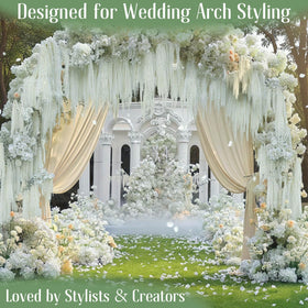 EquSym ivory-white amaranthus drapes gracefully along arches.
