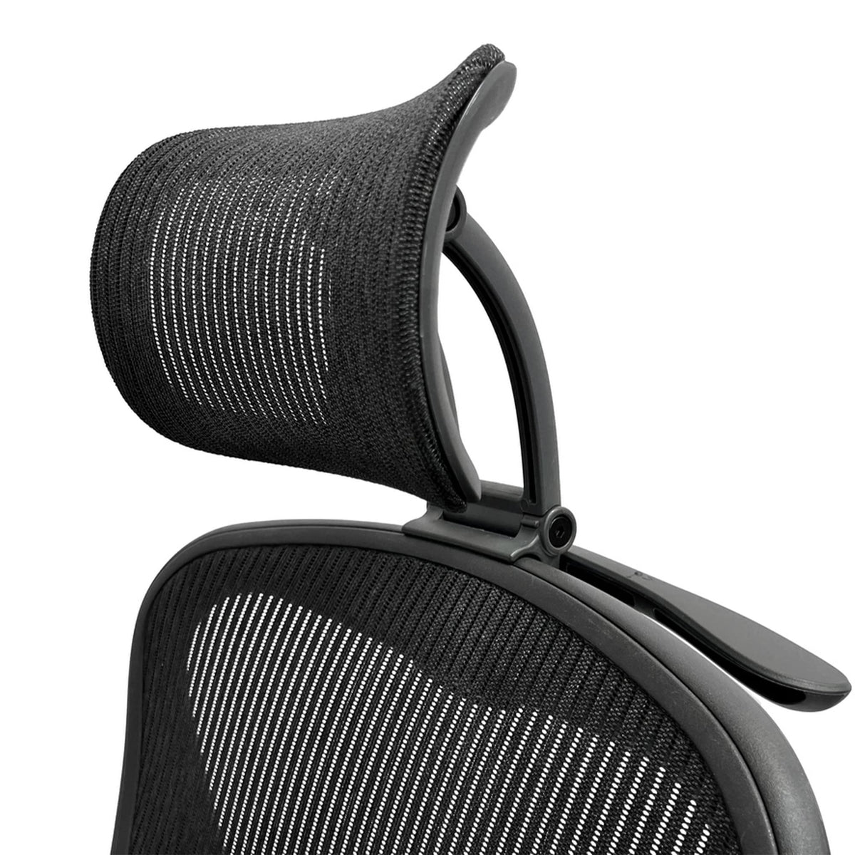 ERGOKING headrest attachment on Aeron chair enhances neck support during long work sessions.