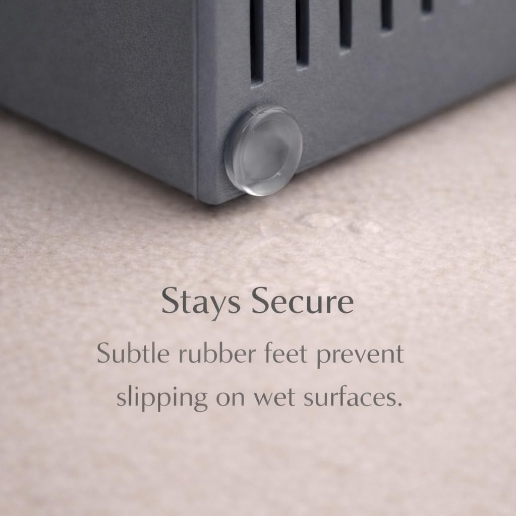 Essence & Abode dark gray shower caddy adds modern storage to any bathroom.