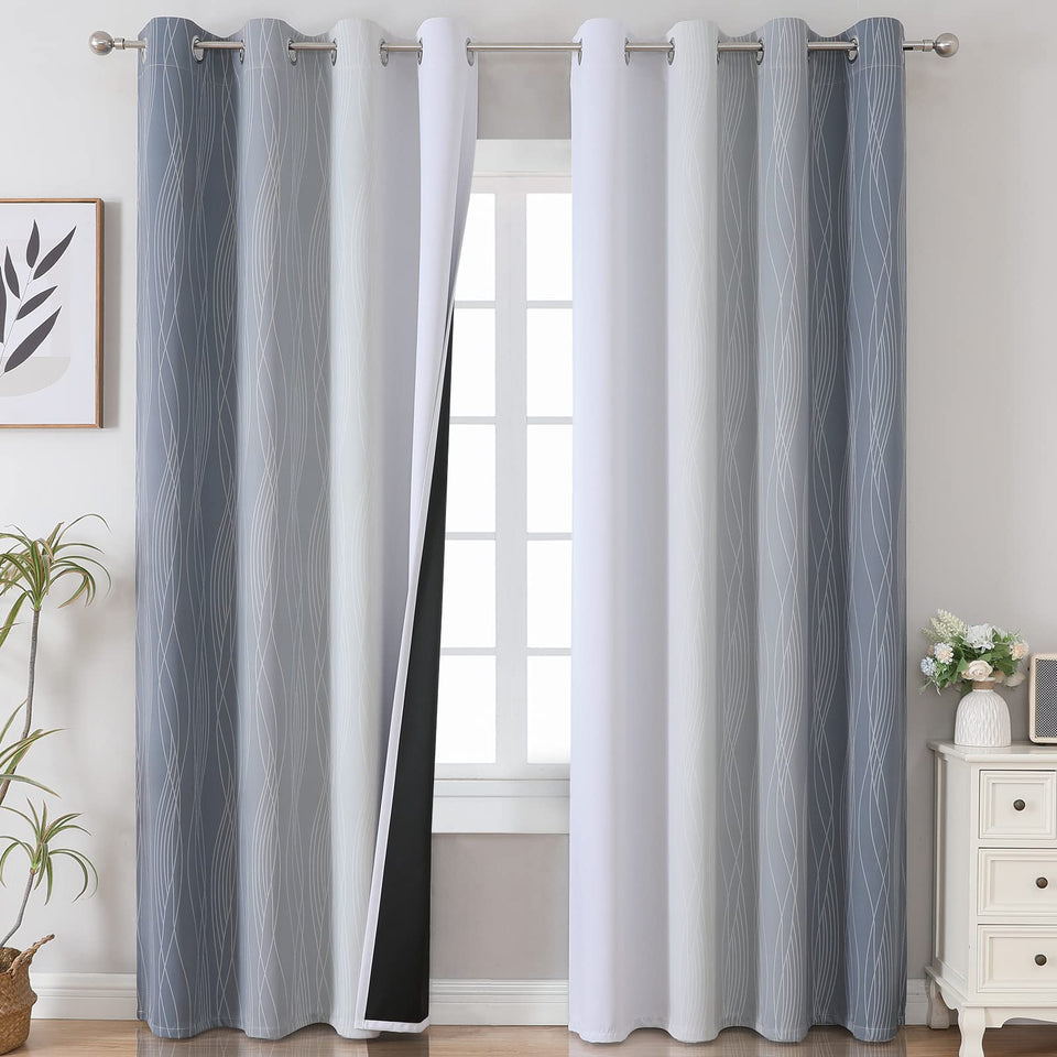 estelar textiler grey ombre blackout curtains in a living room setting with soft gradient drape