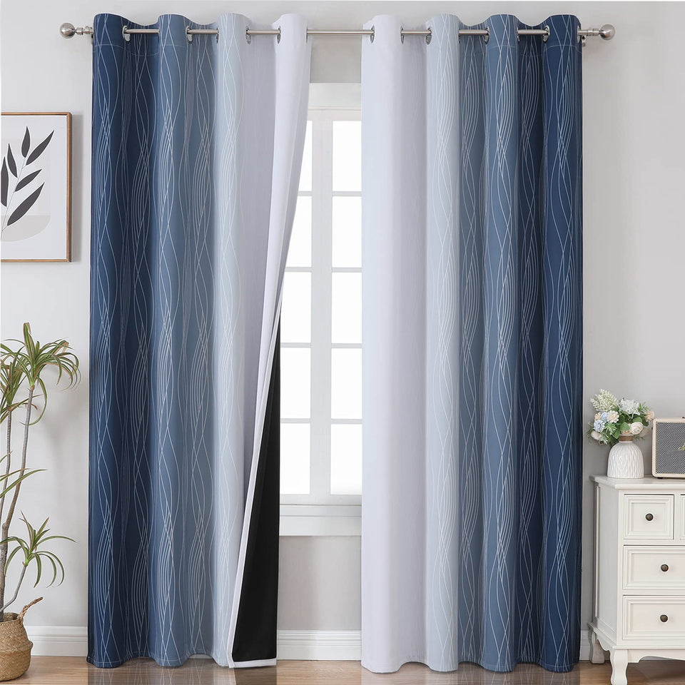 Estelar Textiler Ombre curtains in greyish-white and navy block light for privacy.