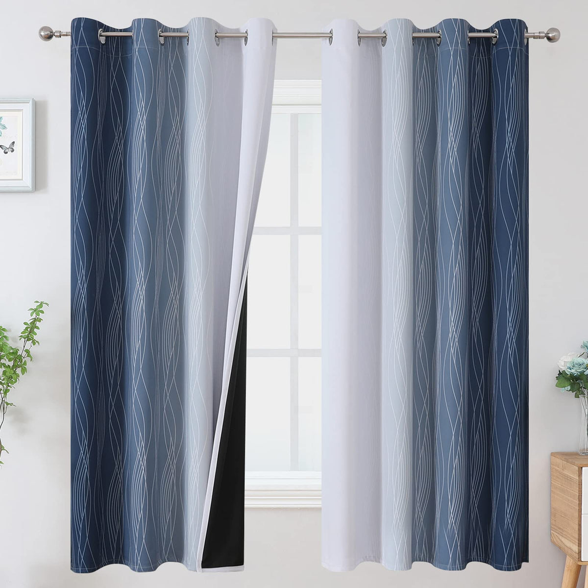 Estelar Textiler ombre curtains with silver grommets enhance privacy and light control.
