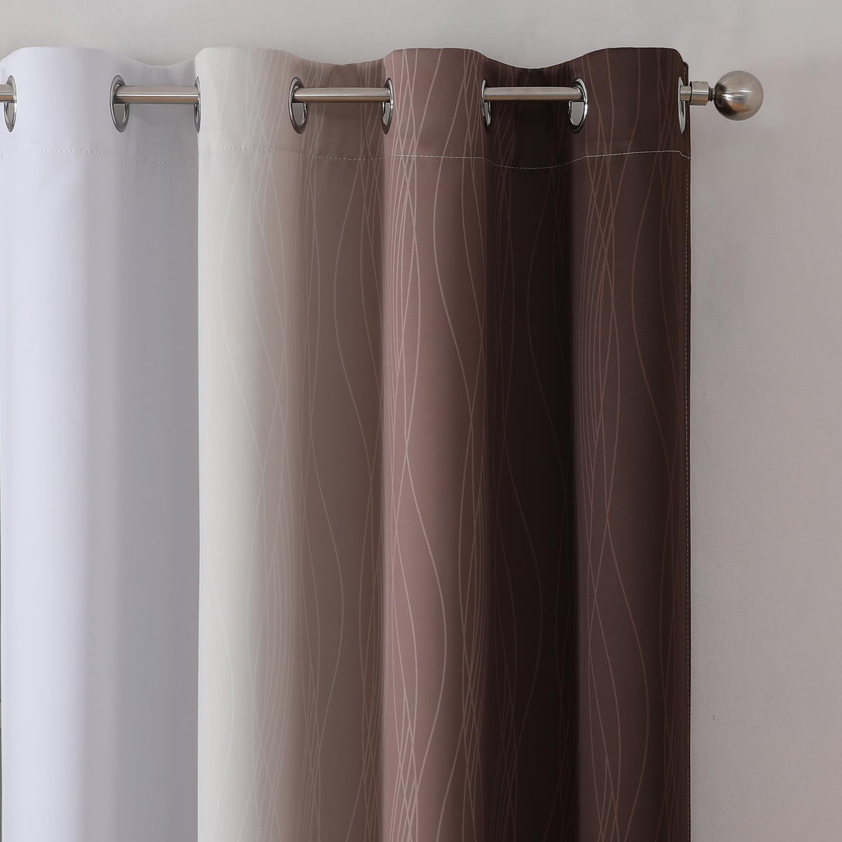 Close-up of rustproof grommets on Estelar Textiler curtain for easy hanging.
