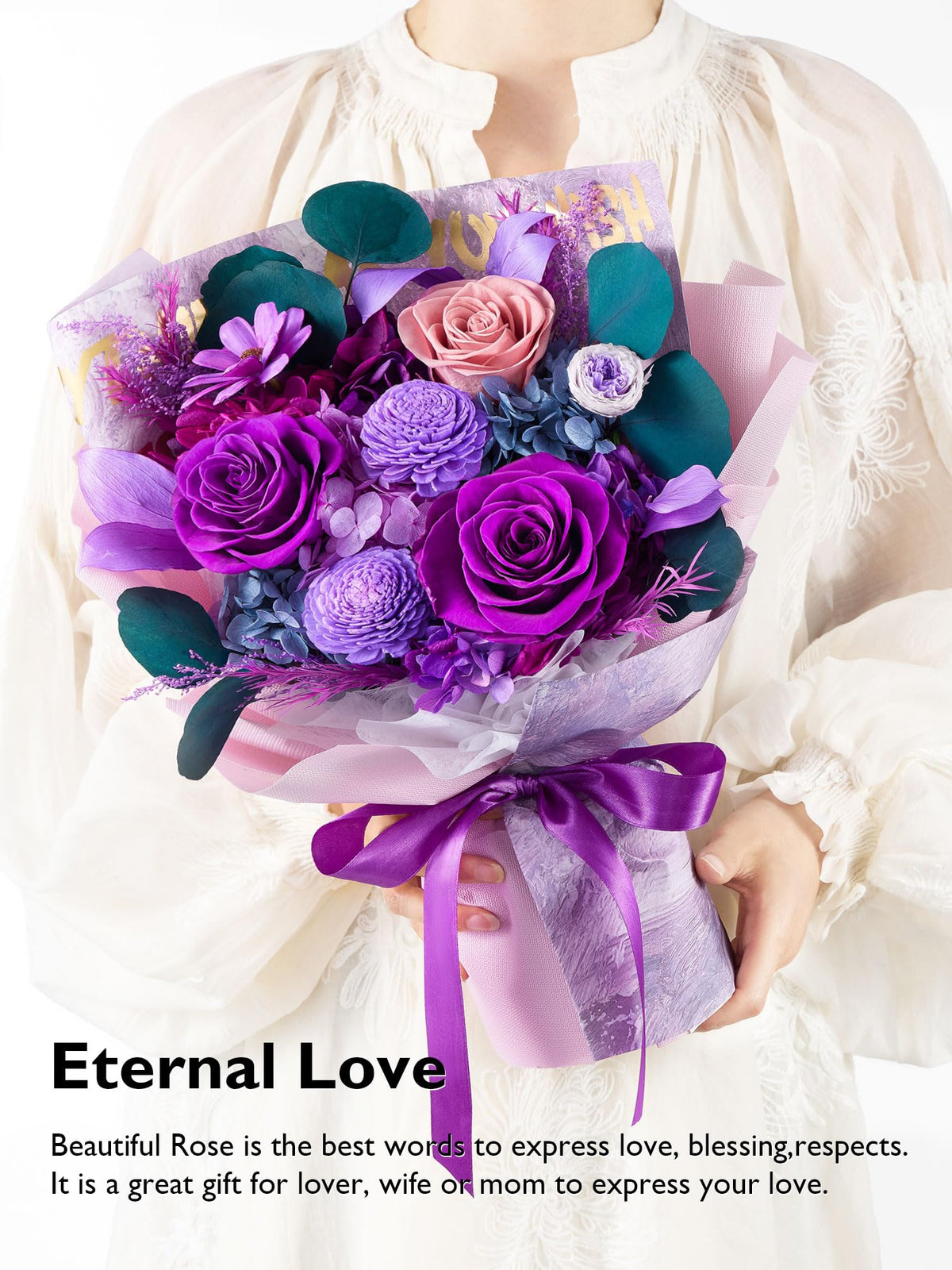 Eterfield preserved roses close-up showing rich purple and dusty pink tones.