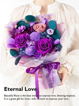 Eterfield preserved roses close-up showing rich purple and dusty pink tones.