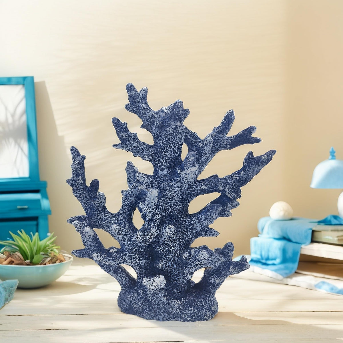 Etlemonde beach house decor coral piece for homes by the sea.