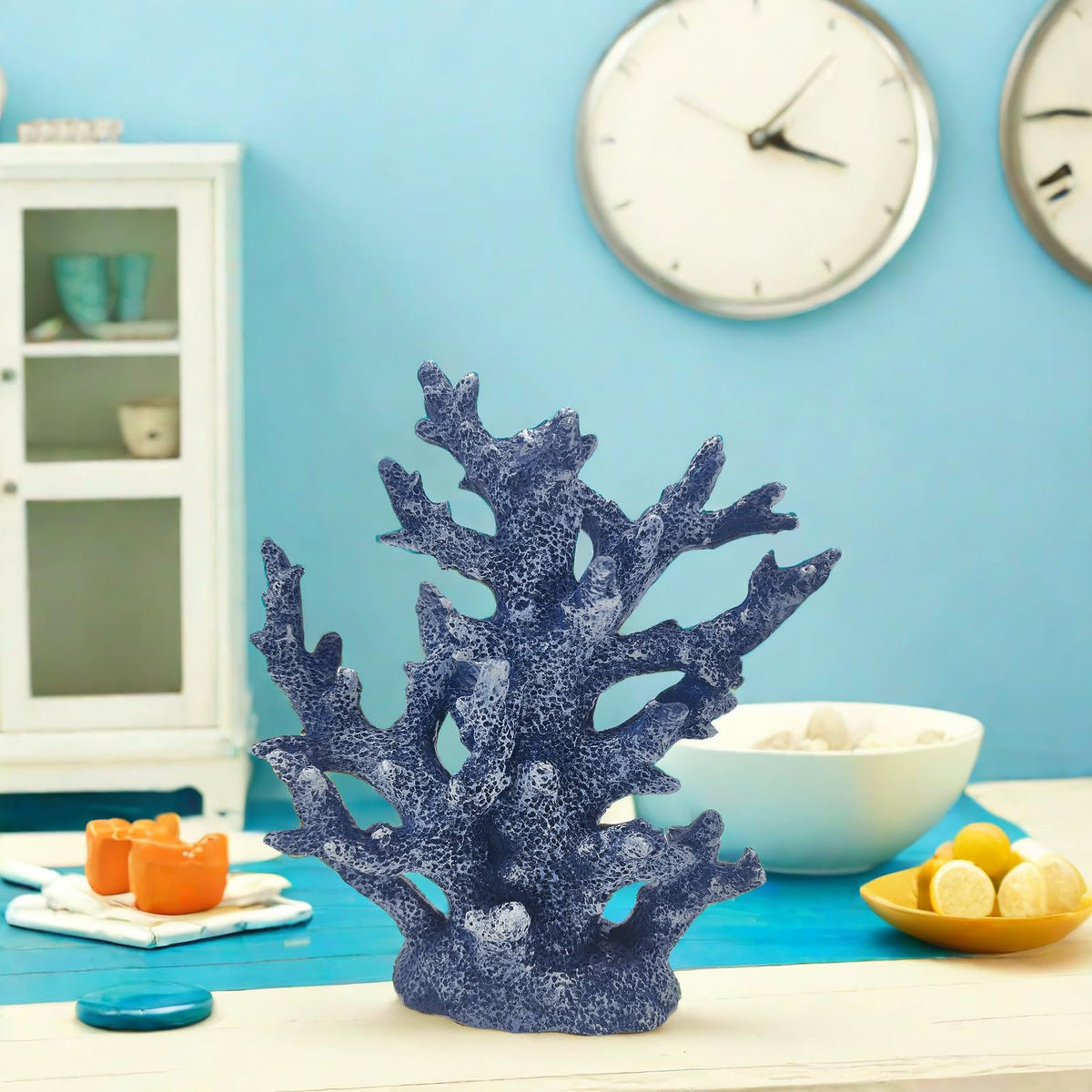 Etlemonde coral art shelf ornament adds texture and charm.