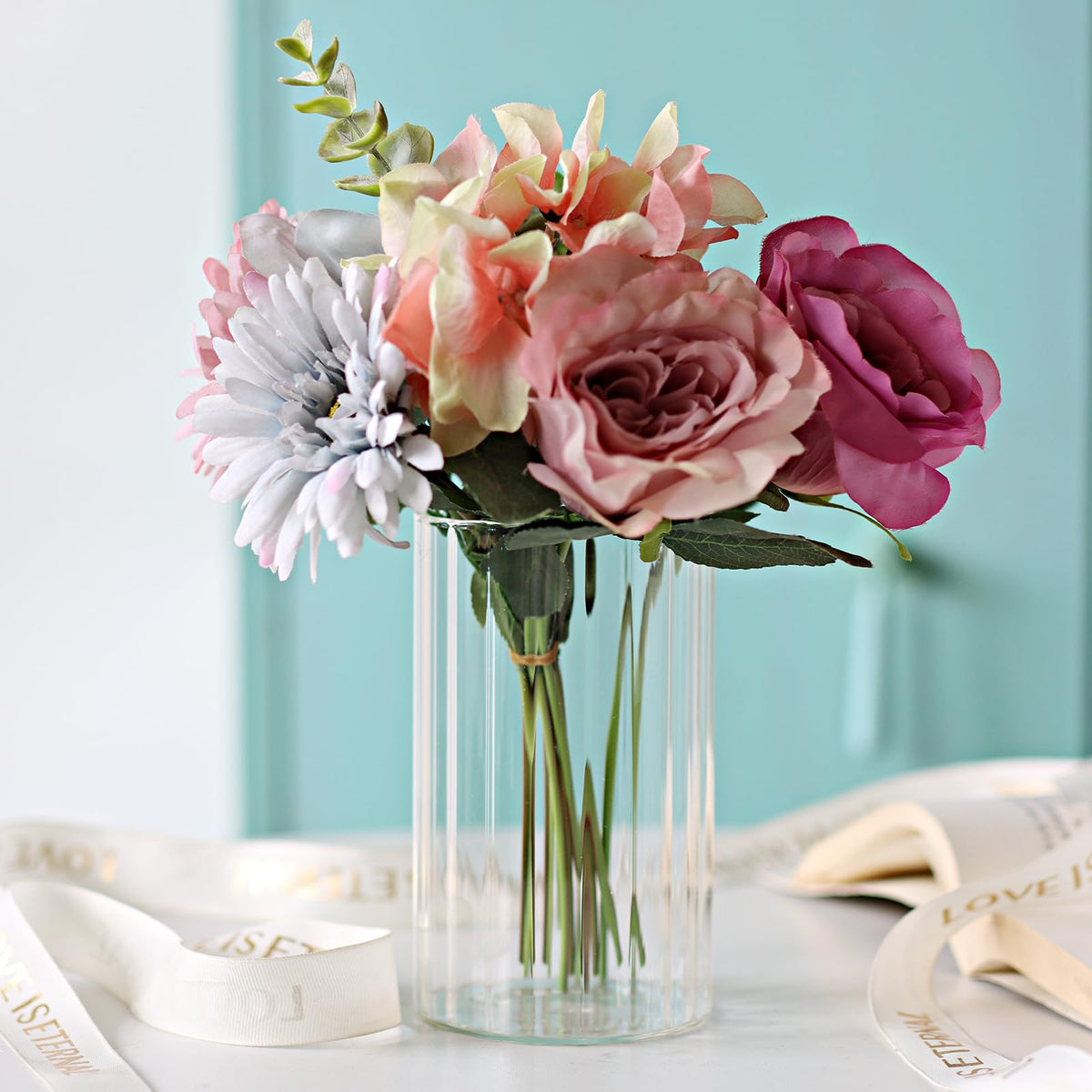 Etolies wedding centerpiece idea using multiple ribbed cylinders