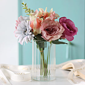 Etolies wedding centerpiece idea using multiple ribbed cylinders