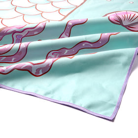 Eunzel hanging-loop towel air-dries neatly on hooks.