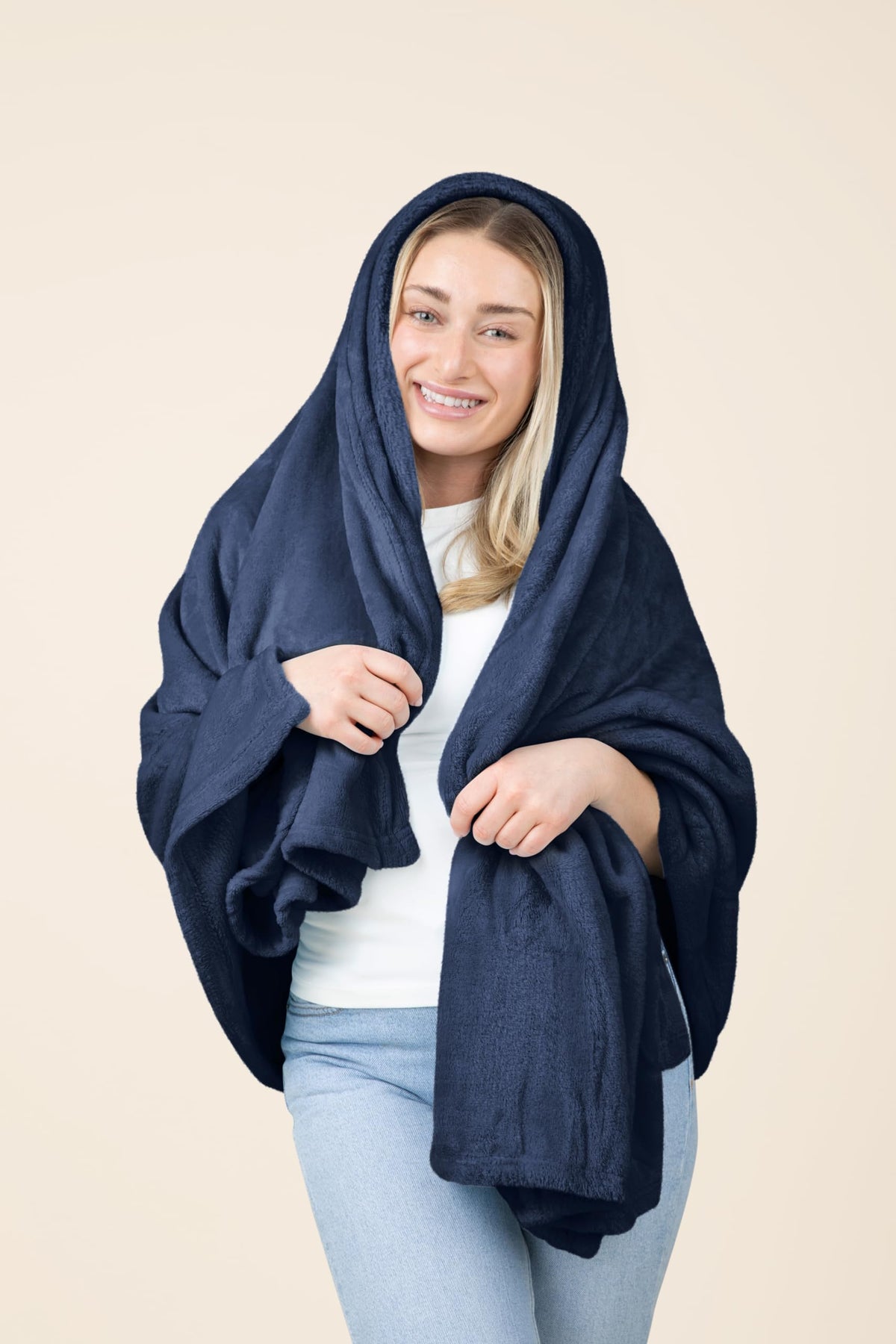 Compact rolled EverSnug travel blanket ready for carry-on