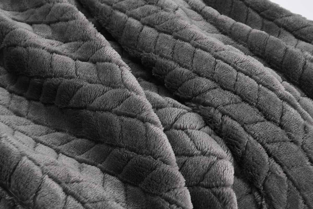 EverSnug hand luggage sleeve secures the blanket to luggage