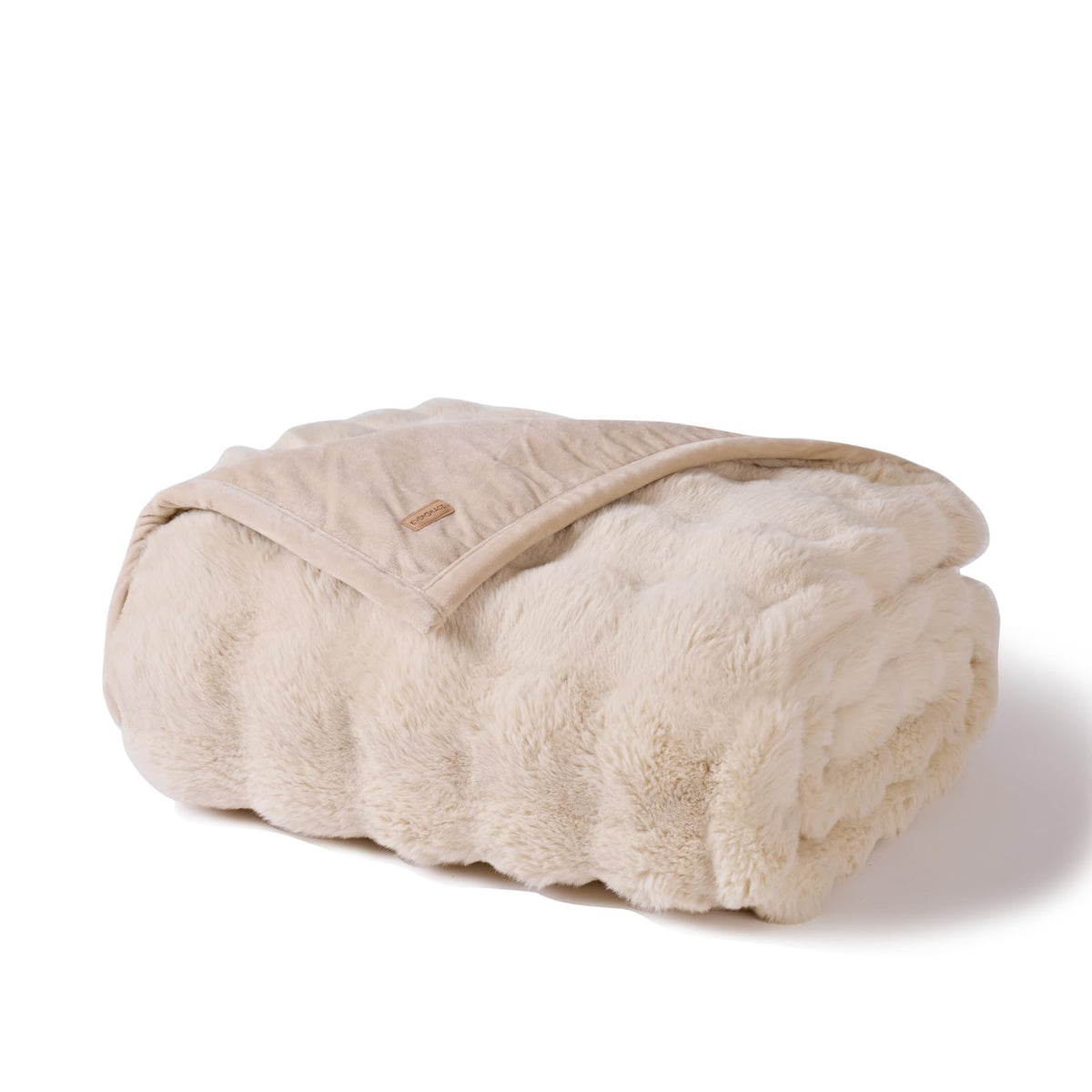 EverGrace cream color blanket adds cozy ambiance to space.