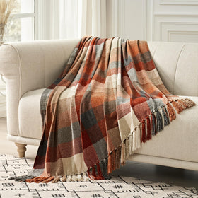 EverGrace plaid chenille throw blanket on a sofa adds cozy style and warmth.