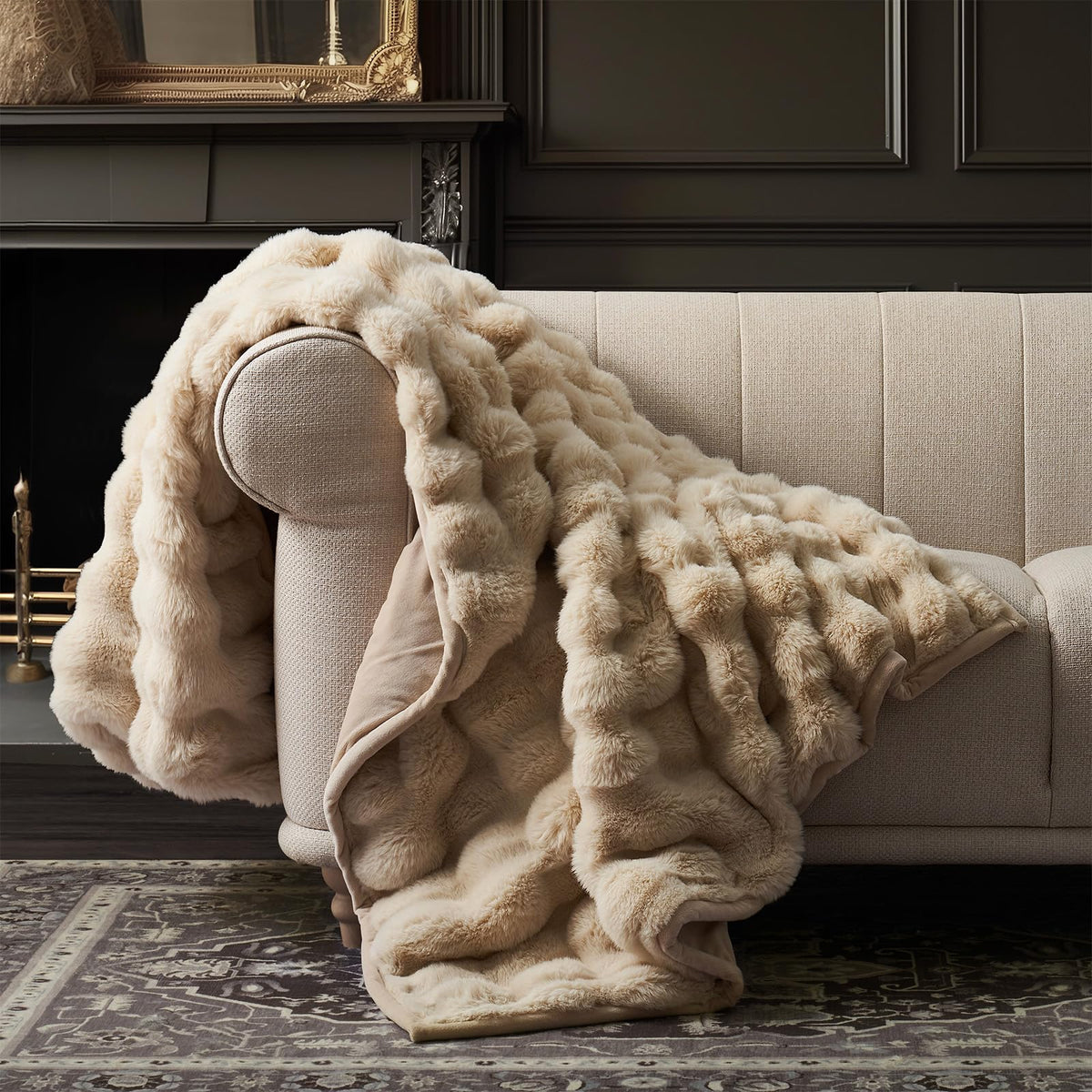 EverGrace Ridgeline faux fur throw with marble tones adds luxury to any room.