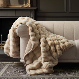 EverGrace Ridgeline faux fur throw with marble tones adds luxury to any room.