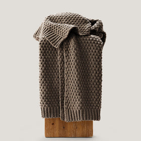 EVERGRACEHOME bed throw draped at foot of bed enhances texture and warmth.