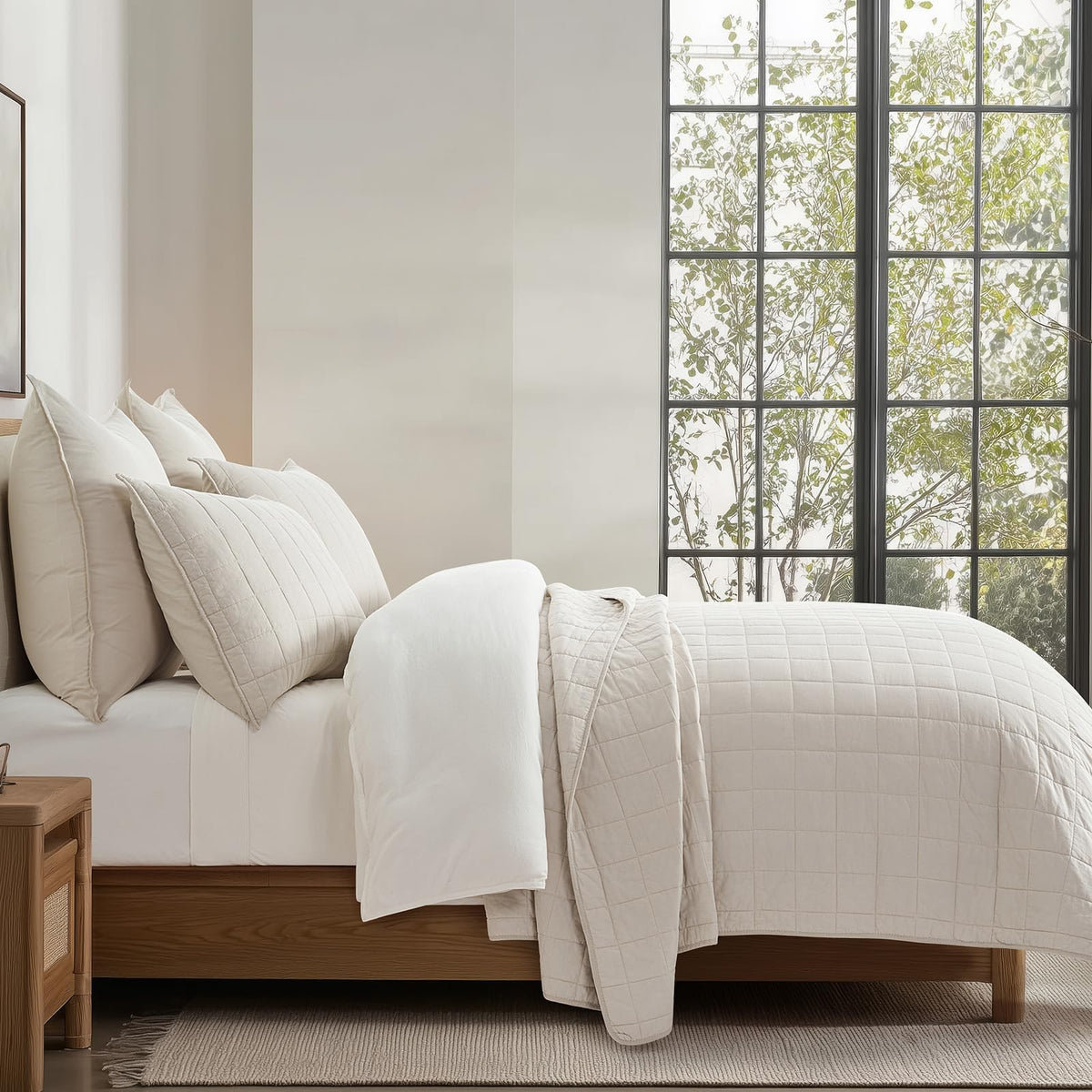 EverGraceHome Birch quilt draped on a bed shows lightweight all-season comfort.