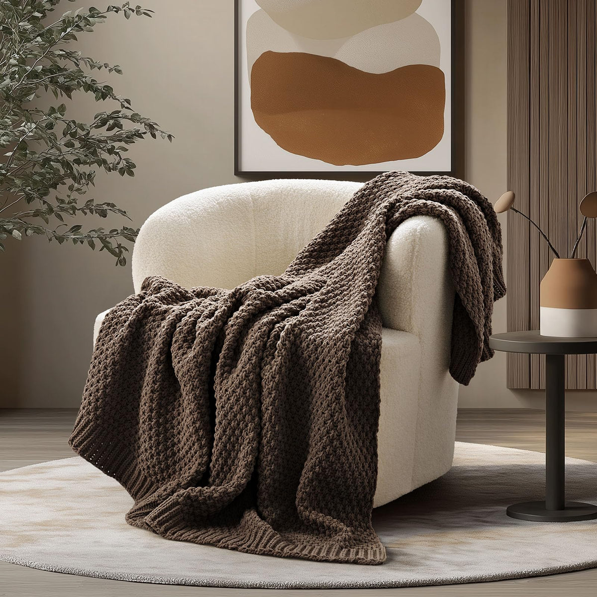 EVERGRACEHOME chunky chenille knit throw in cocoa draped on a couch for cozy warmth.