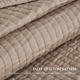 EVERGRACEHOME king-size quilt on bed measures 108 by 96 inches.