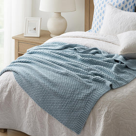 EVERGRACEHOME throw-folded-at-foot-of-bed adds warmth and style.