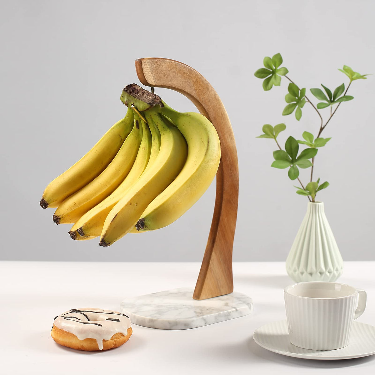 Everous wood and marble stand adds elegance to countertops.