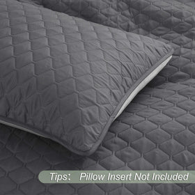 Exclusivo Mezcla all-season bed setup demonstrating versatile styling in gray.