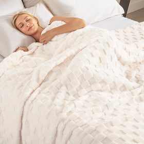 Exclusivo Mezcla premium blanket showcases luxurious velvety texture and subtle sheen
