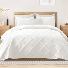 Exclusivo Mezcla king quilt set basket-weave close-up for durable, lightweight texture.