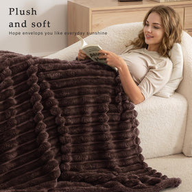 Exclusivo Mezcla King Size Flannel Blanket striped jacquard pattern adds modern flair.