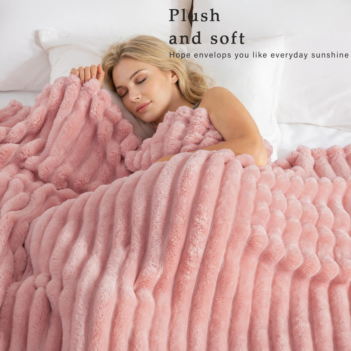 Exclusivo Mezcla pink blanket close-up shows plush brushed microfiber texture for softness