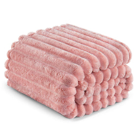 Exclusivo Mezcla king size blanket folded on bed ready for night